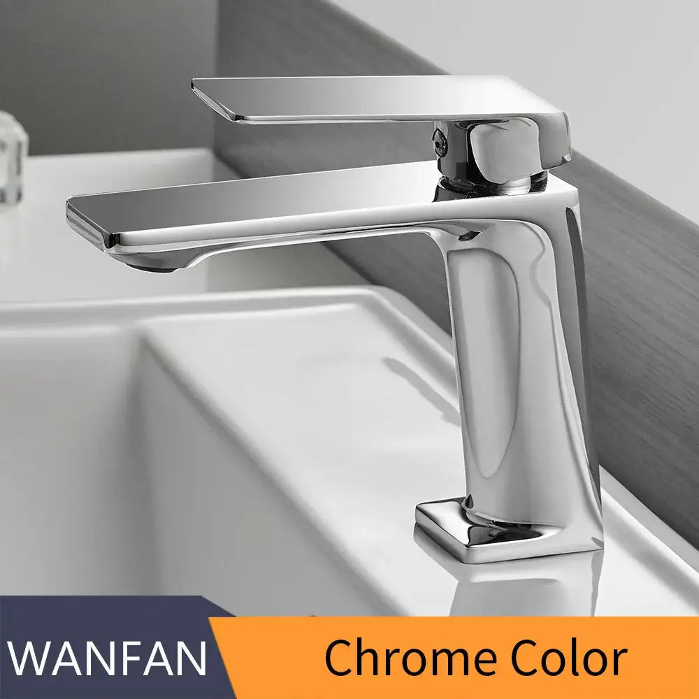 Chrome finished modern basin faucet mixer tap with sleek angular design and flat spout for bathroom use
