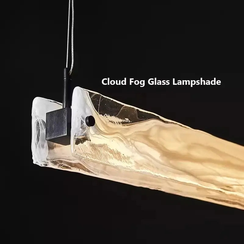 Modern minimalist cloud fog glass pendant light with translucent textured amber lighting for dining room use