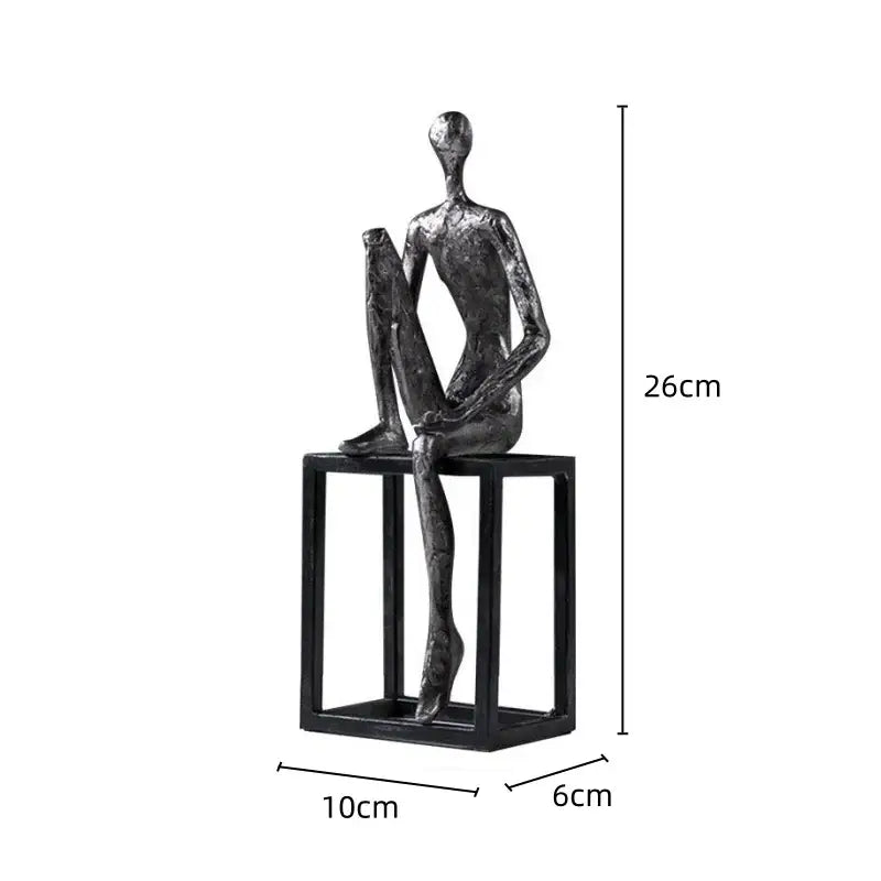 A sleek oxidized silver abstract thinkers sculpture with textured metallic finish on black cube base for decorbites decorbites abstract