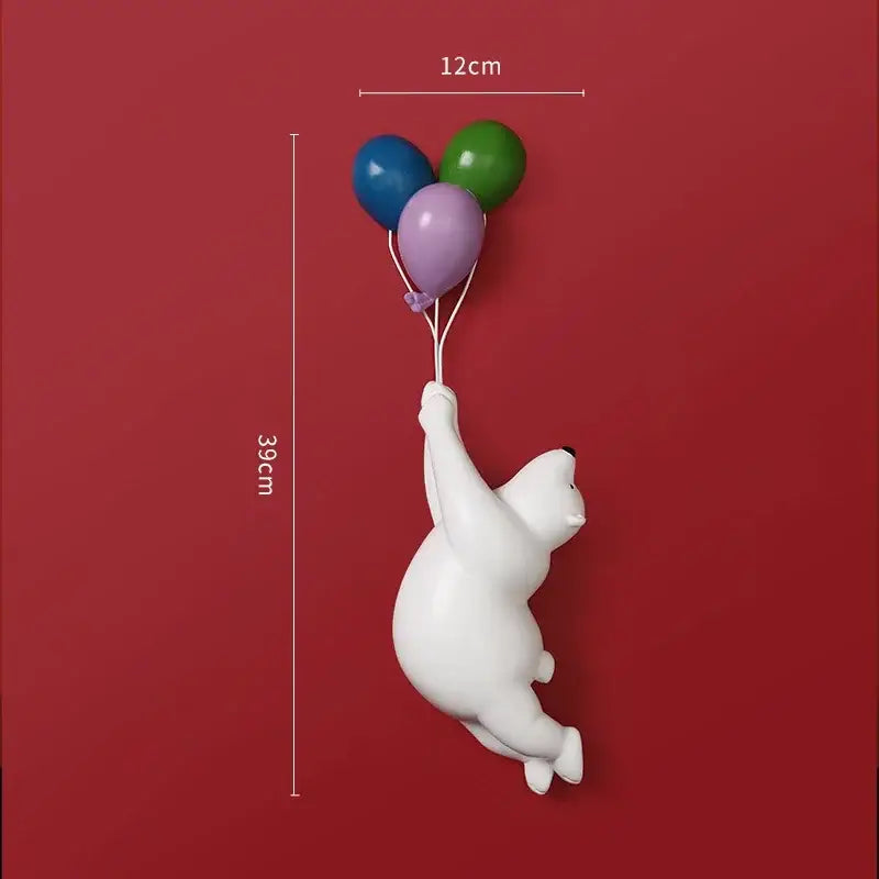 Modern white ceramic bear figurines featuring a flying polar bear holding three colorful balloons for kids bedroom decor