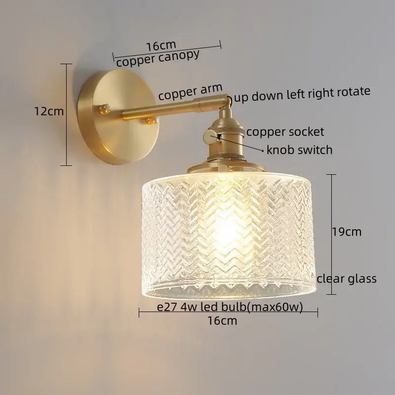 Brass-finished copper wall lamp with green glass led clear shade featuring embossed chevron pattern for bedroom lighting