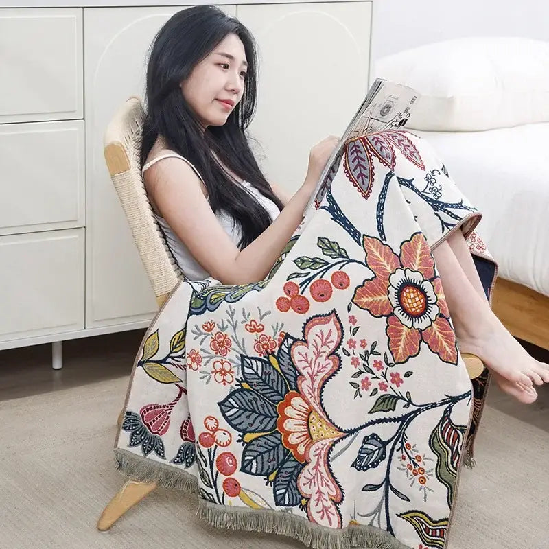 A cozy cream-colored decorbites gauze flower bath towel with vibrant multicolor floral pattern for bedroom decor