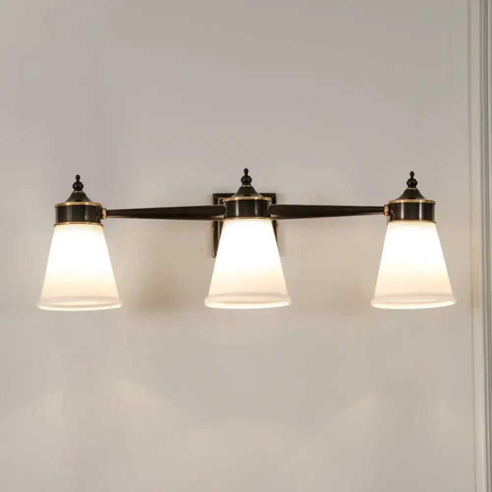 Postmodern brass and cream glass wall sconce with bronze finish and three frosted glass shades for bathroom vanity lighting