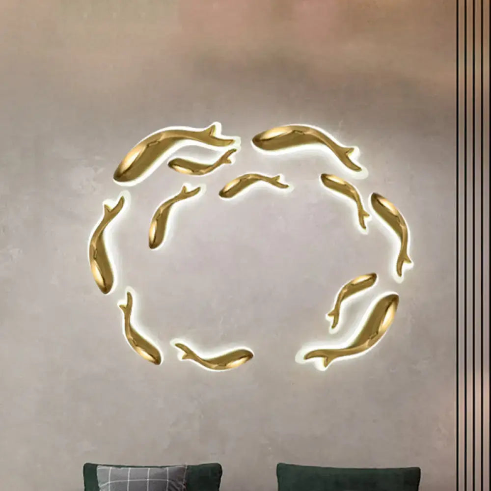 Postmodern gold dolphin led wall lighting fixture shaped like a glowing fish for bedroom wall lighting use