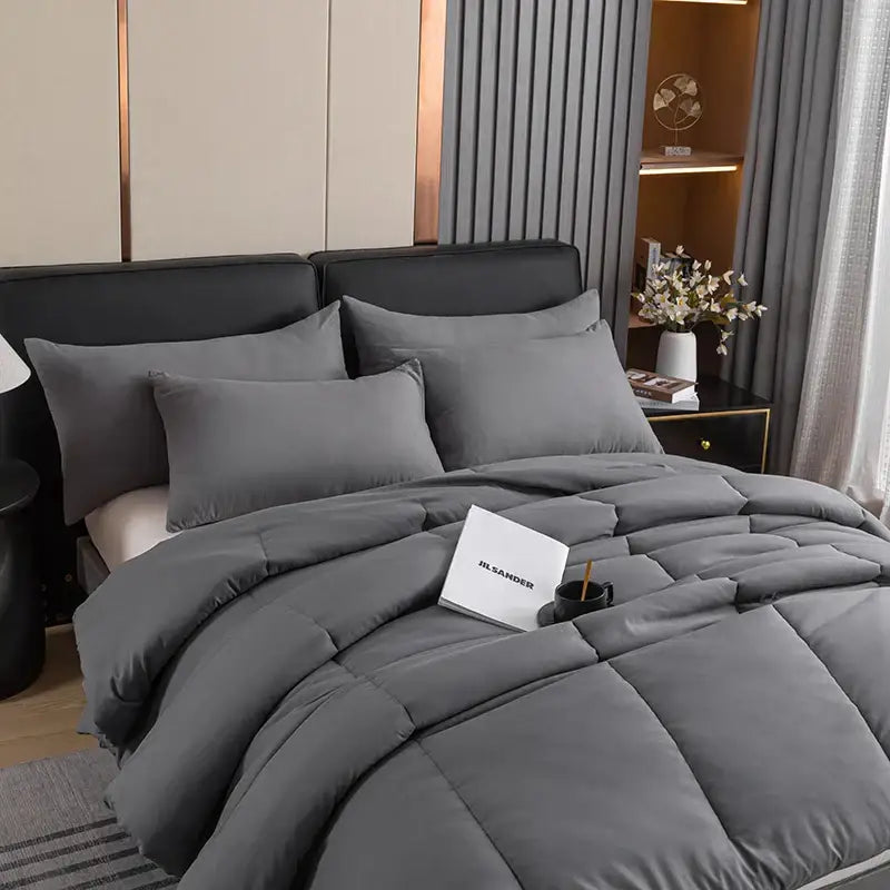 Gray quilted comforter with plush texture and subtle stitching in decorbites cozy queen king pillowcase set