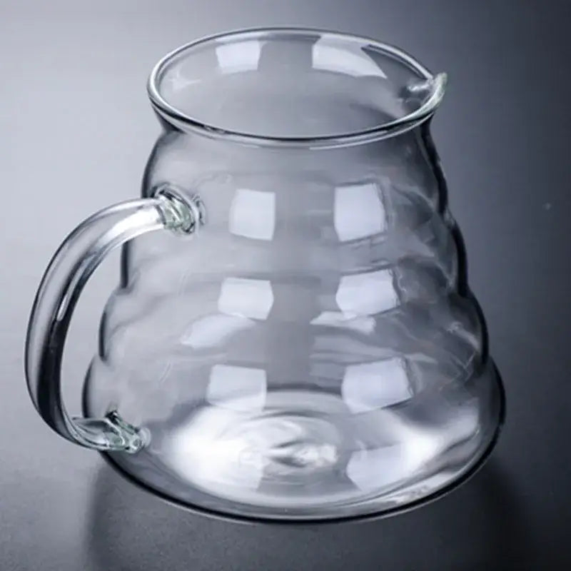 Clear glass coffee maker pot with honeycomb texture and curved handle for precise coffee brewing with wood lid