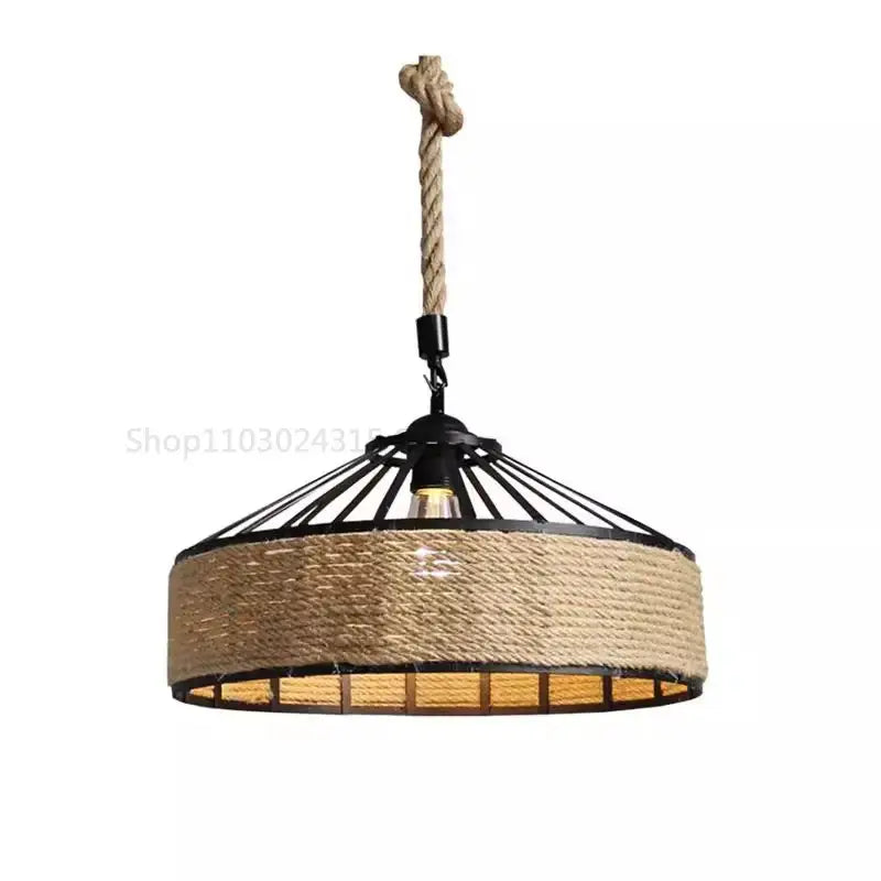Rustic black iron pendant light with rope-inspired detailing and natural fiber cord pendant for kitchen use