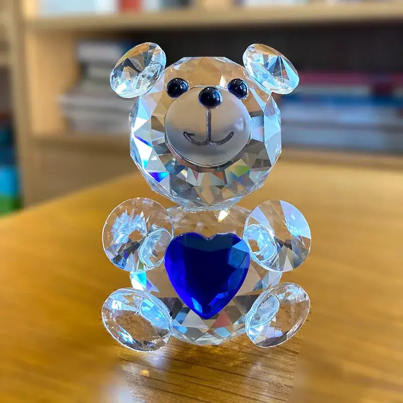Sparkling decorbites crystal bear figurine holding a vibrant blue heart gemstone for bedroom decor