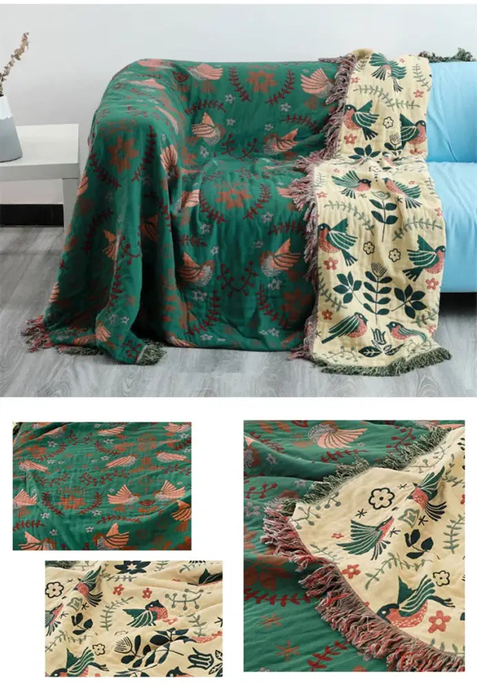 Teal and gold embroidered cotton gauze non-slip sofa blanket with bird and floral pattern in earthy tones for living room decor