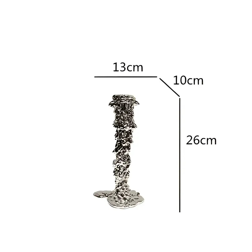 Silver metallic candlestick holder with textured layered design and flared base by decorbites golden candlestick holder
