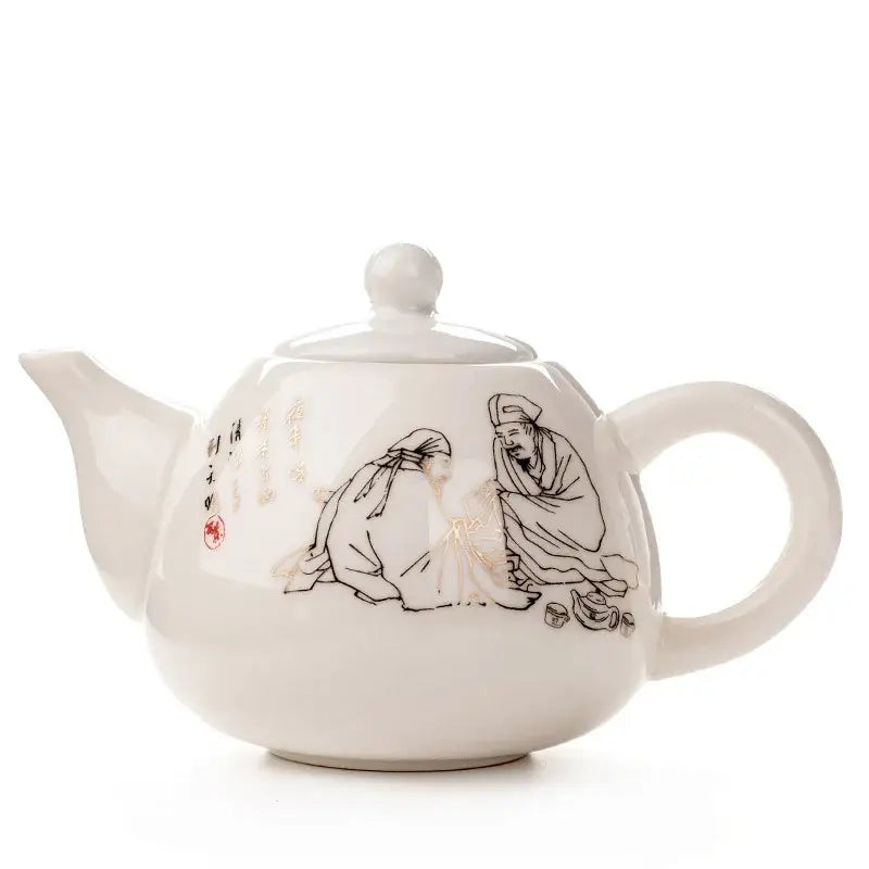 White ceramic dehua clay teapot with black ink illustrations gold accents and red seal in decorbites dehua clay tea set