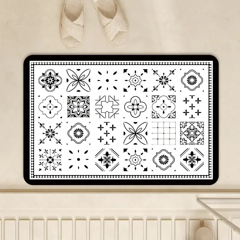 Vintage beige and cream absorbent bathroom mat with black and white tile pattern made of diatom ooze absorbent material