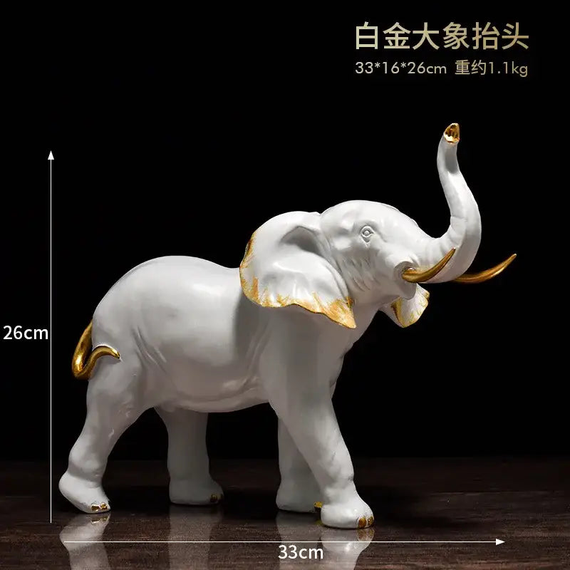 White and gold elephant resin sculpture ornaments in porcelain with gold accents for living room decorbites elephant resin decor