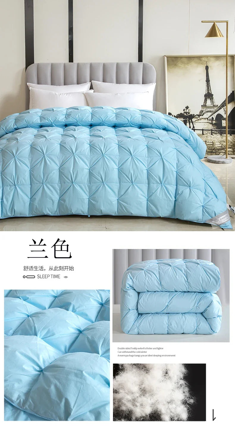 Light blue 100% white goose down comforter with diamond stitching and plush filling made of pure cotton for winter use