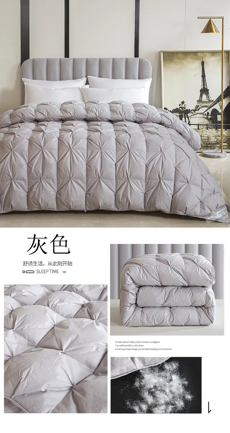 Gray quilted 100% white goose down comforter with plush texture and subtle geometric stitching for winter use