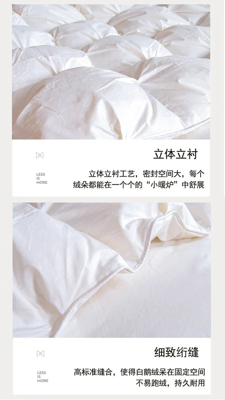 White quilted comforter with plush puffy texture and precise stitching made of 100 percent white goose down and cotton