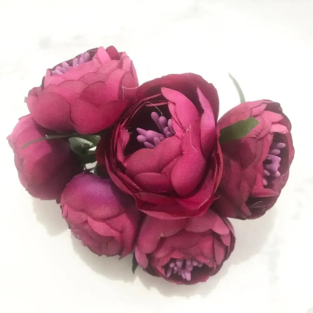 A cluster of deep magenta 200pcs mixed rose red fabric peonies with purple stamens and green stems for diy decor