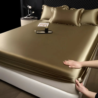 Gold satin fitted sheet and pillowcase set made of 100% mulberry silk for a soft luxury sheet set