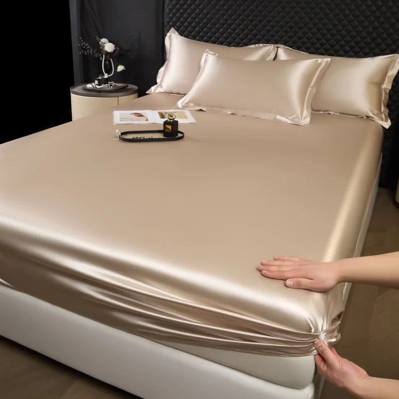 Beige satin fitted sheet with smooth glossy finish and elasticized edges from 3 pcs mulberry silk sheet set