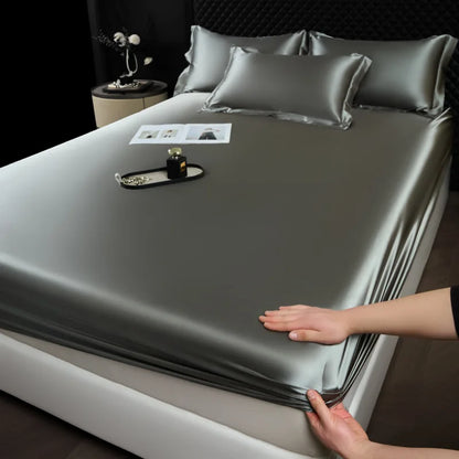 Silk-like gray satin sheet set with matching pillowcases featuring a fitted sheet made from 100 percent mulberry silk