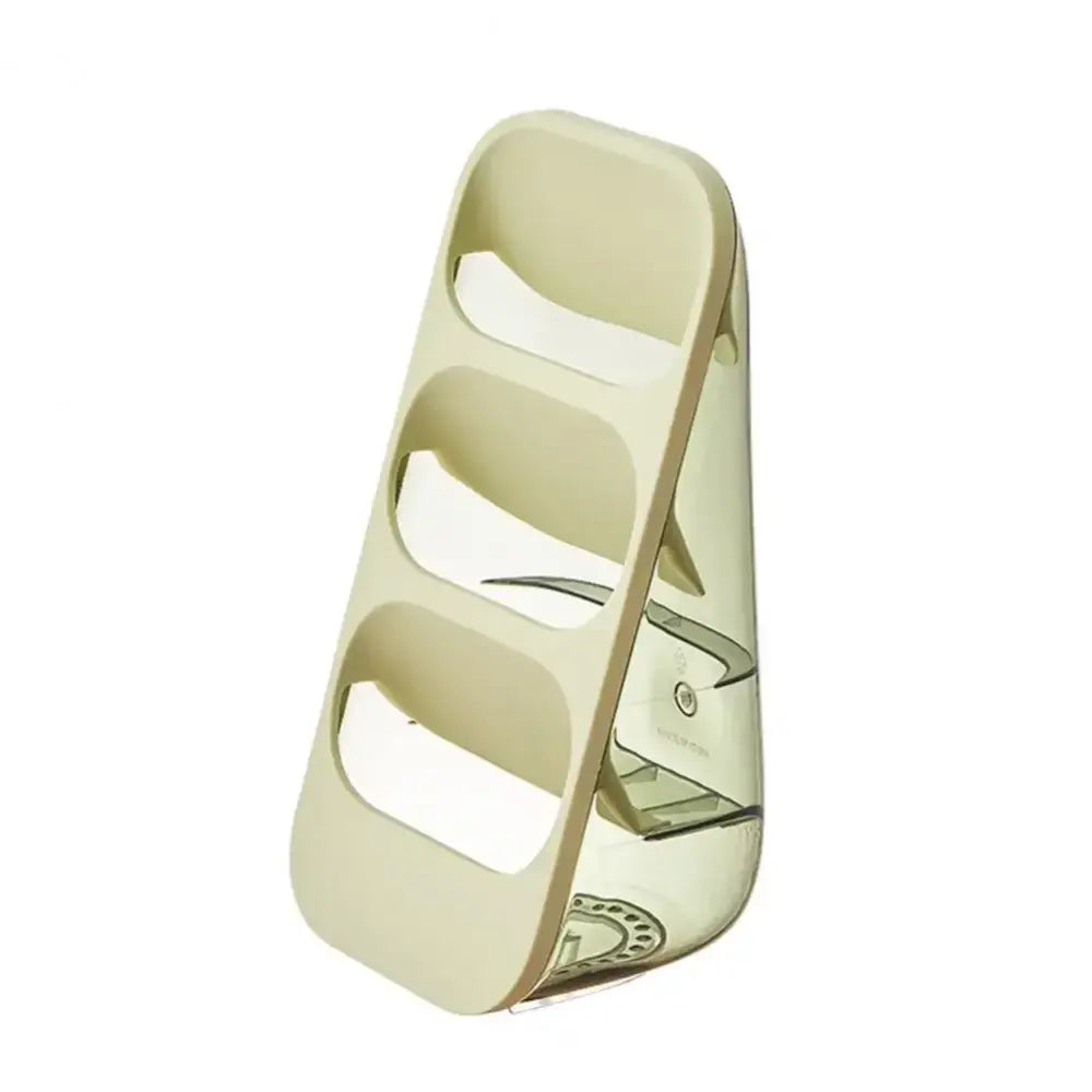 Cream-colored plastic egg holder with three compartments for 3-tier gray and sage green kitchen utensil organizer cutlery rack