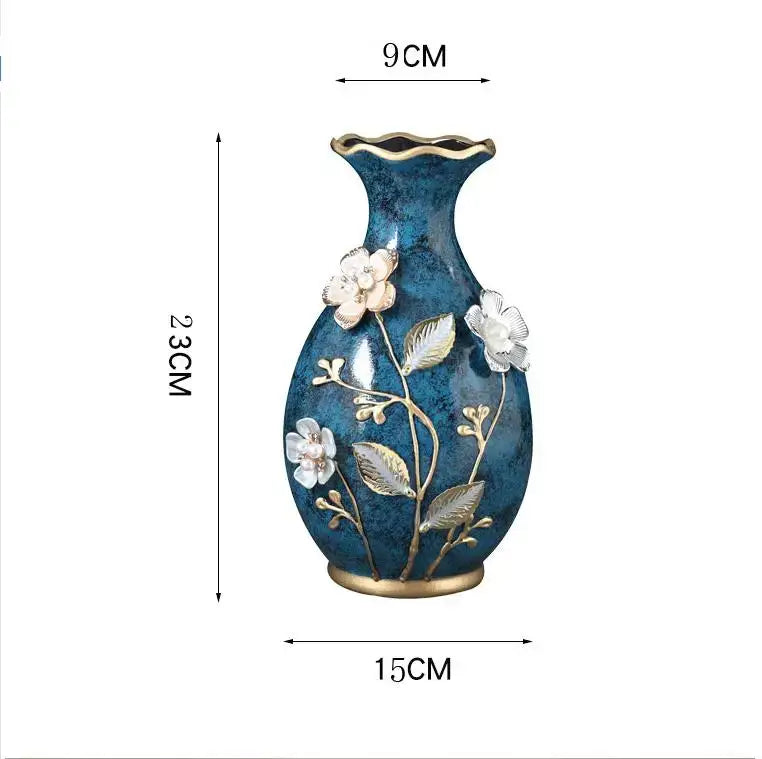 Deep blue ceramic vase with gold-trimmed rim and raised white floral motifs for dried flowers and wobble plate use