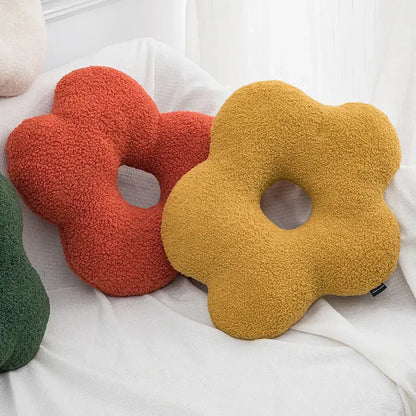 Soft plush flower decor nordic cushion in warm mustard yellow with fuzzy texture and central hole for living room use