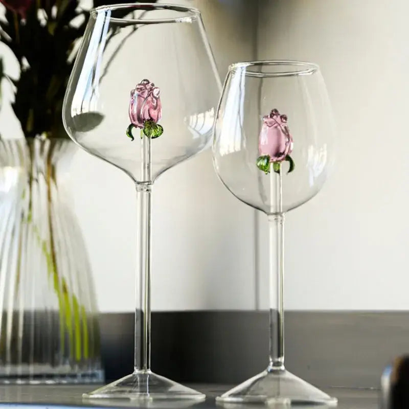 Clear glass wine goblets with 3d pink glass rose embellishments and green stems for decorbites 3d pink dining room drinkware set