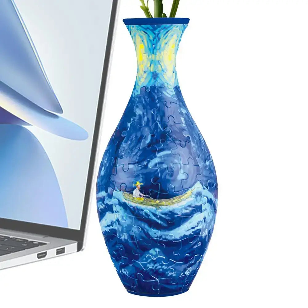 A blue curved puzzle vase building set featuring a swirling ocean scene and van Gogh starry night design