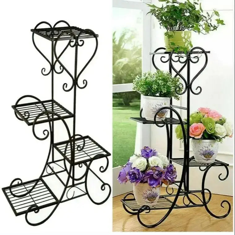 Black wrought iron metal plant stand with ornate scrollwork and four tiered shelves for indoor and outdoor display