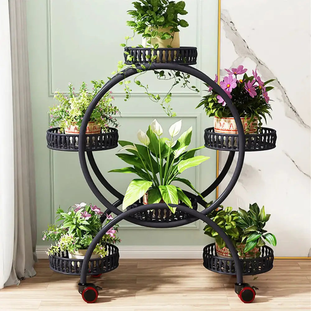 Black circular metal plant stand shelf with multiple tiers and red wheels for indoor plant display DecorBites 4-wheel model