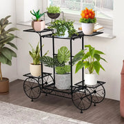 Black wrought iron DecorBites™ 6-tier metal plant stand with ornate wheel design for indoor and outdoor plants