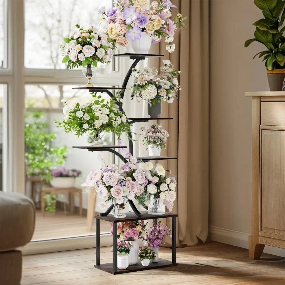 DecorBites™ black metal 7 tier plant stand display rack with white pink and purple flowers in various vases