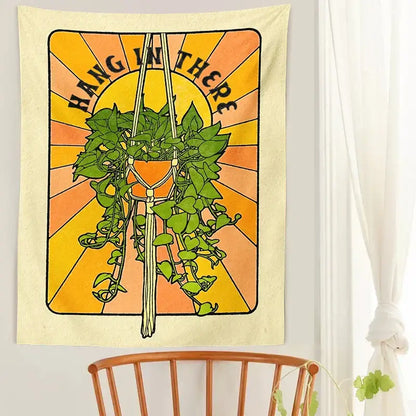 Cream-colored 70s retro botanical tapestry wall hanging featuring a stylized hanging plant and hang in there text for bedroom decorbites decor