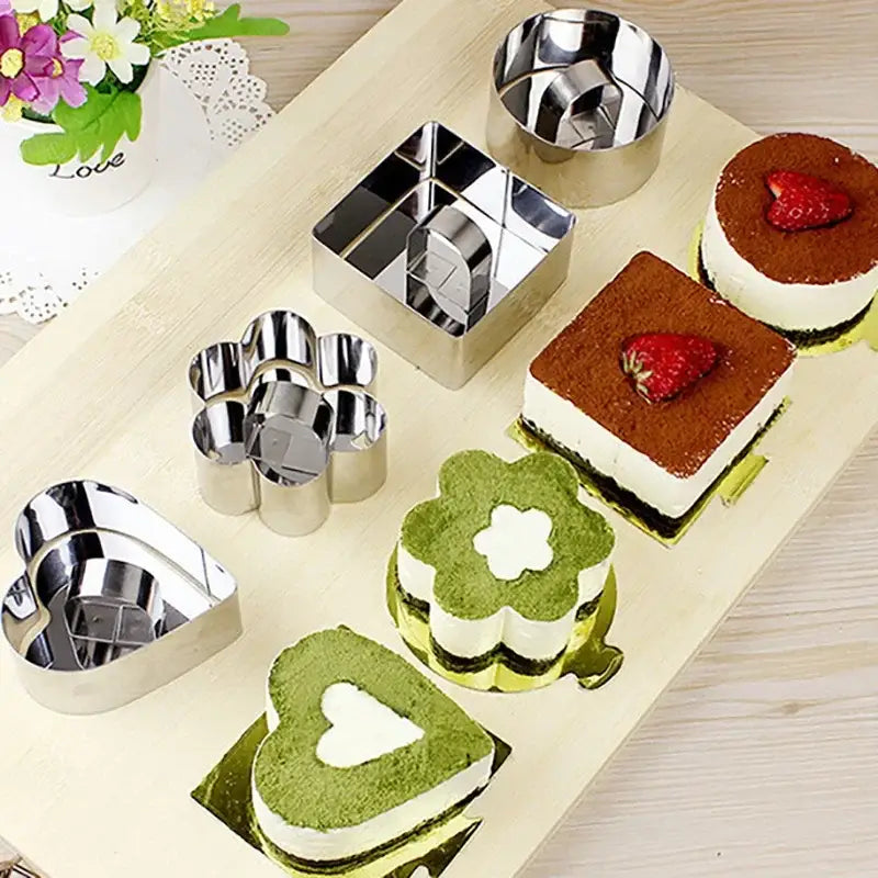 Set of 9 shiny stainless steel bakeware mold cookie cutters in heart, flower, square, and round shapes