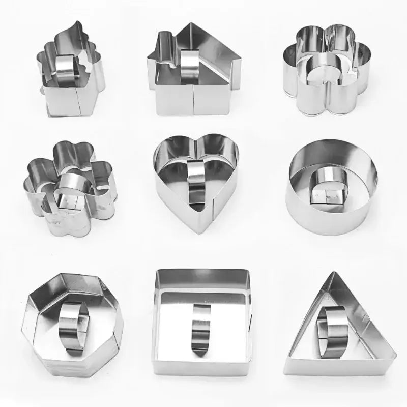Set of nine stainless steel bakeware mold cookie cutters in various shapes including house heart flower and geometric forms