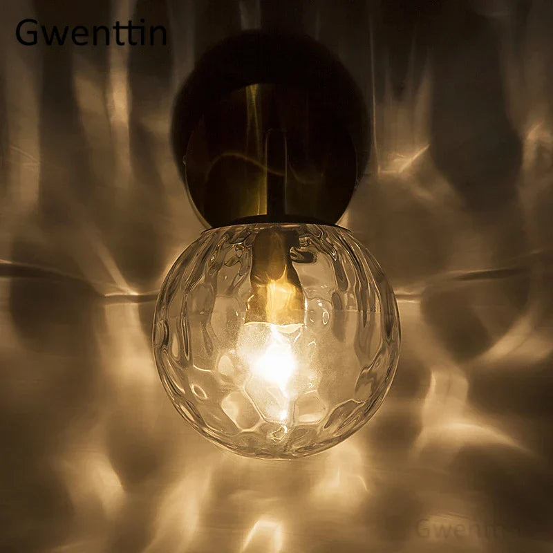 Gold Glass Ball Mirror Sconce