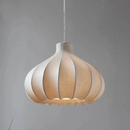 A warm-toned segmented paper decorbites led pendant light with soft diffused glow for home lighting decor