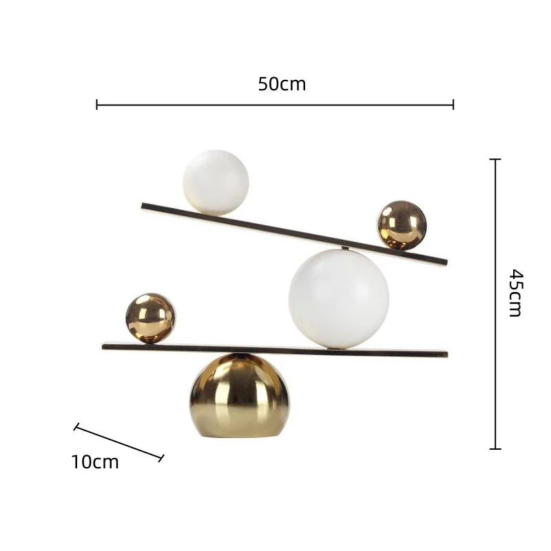 DecorBites™ Geometric Golden Ball Metal Seesaw Ramp Figurines for Home Decor