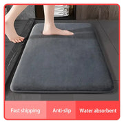 Dark gray plush coral velvet floor mat with absorbent coral velvet surface and non-slip backing for bathroom use