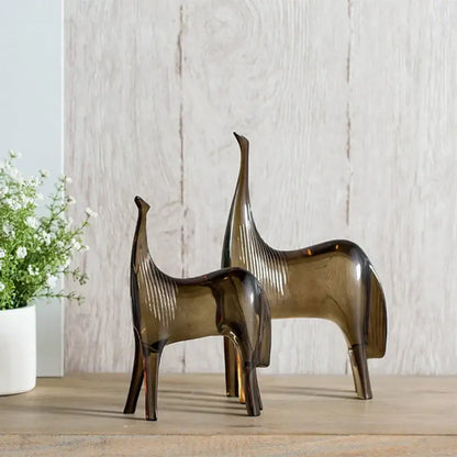 Two amber glass horse couple sculpture set with ribbed detailing ideal for living room decorbites horse couple display