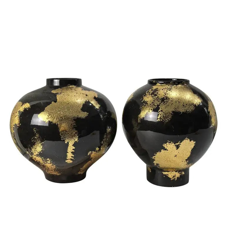 Pair of glossy black ceramic vases with scattered gold foil pattern accents for living room decor