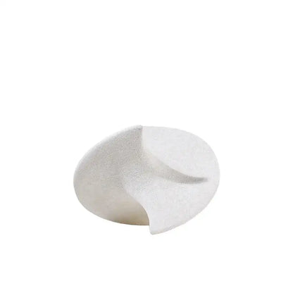 A sleek off-white ceramic gyroscope ornament with smooth flowing form and subtle texture for living room decor