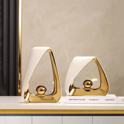 White and gold triangular ceramic decor with glossy finish featuring geometric triangles for home decor accents