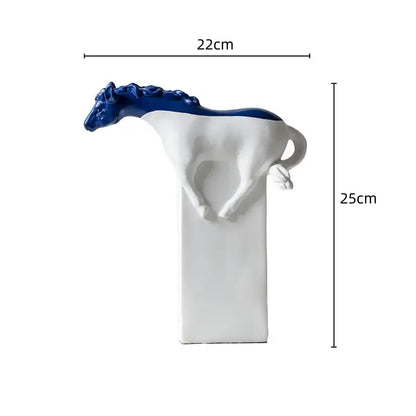 A sleek white ceramic vase with a glossy blue horse figurine atop detailed in the decorbites horse statue collection