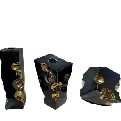 Set of three glossy black ceramic notch ceramic vases with golden sculptural accents for living room decorbites golden notch accessory