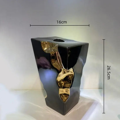 Black ceramic abstract vase with glossy finish and golden notch ceramic sculptural accents for living room decorbites decor