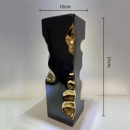 A sleek black ceramic notch ceramic vase with golden notch ceramic accents for modern living room decorbites decor