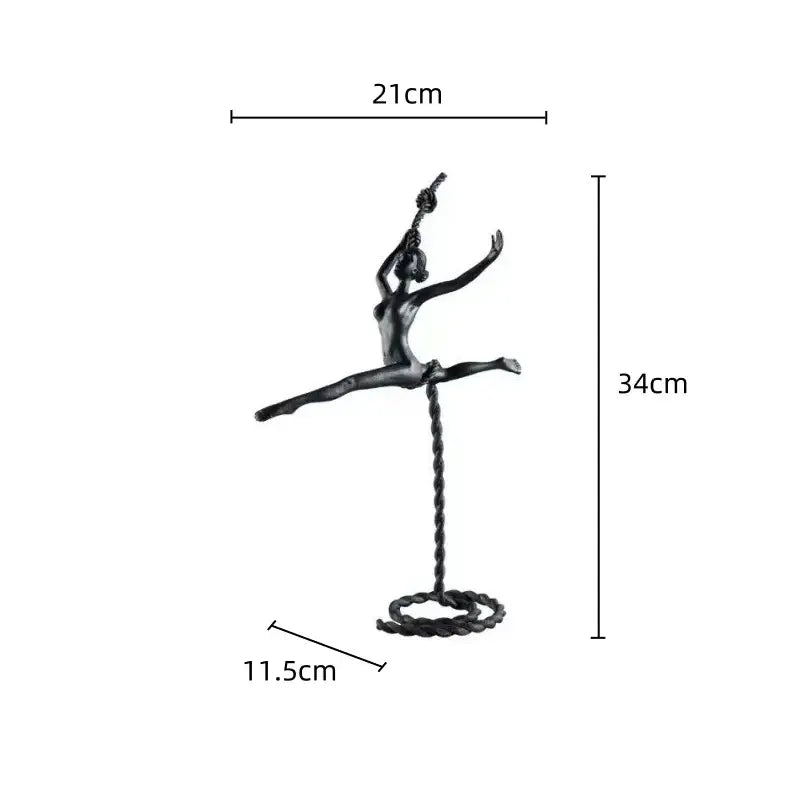Black metal ballerina dancer sculpture balancing mid-air on a twisted rope loop for living room decorbites decor
