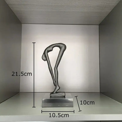 Silver abstract metal gymnast statue desk ornament featuring a bent-over figure on a rectangular base for decorbites decor